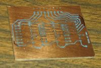 One of the PCBs with the paper removed, and just the mask reaining.